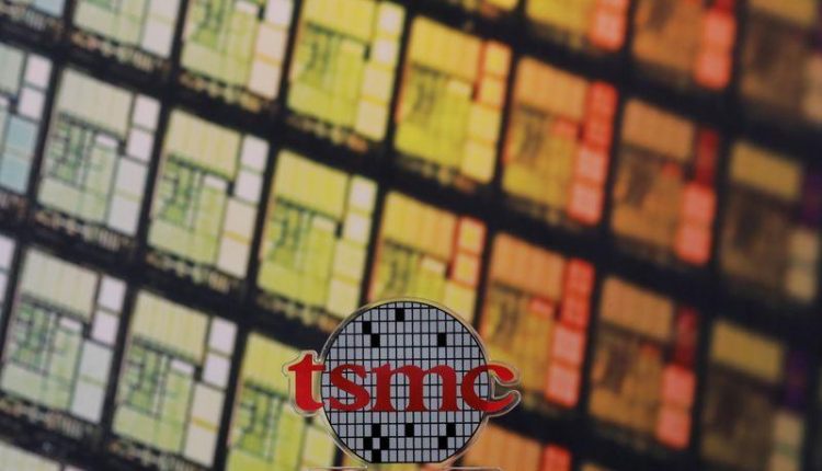 UPDATE 1-TSMC Q4 profit rises 23% to record high on work-from-home, iPhone boost