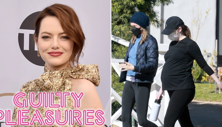 Pregnant Emma Stone pictured cradling baby bump as she expects first child with husband Dave McCary