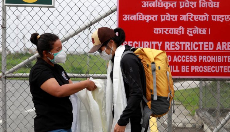 Tired but safe: Everest record-making climbers return