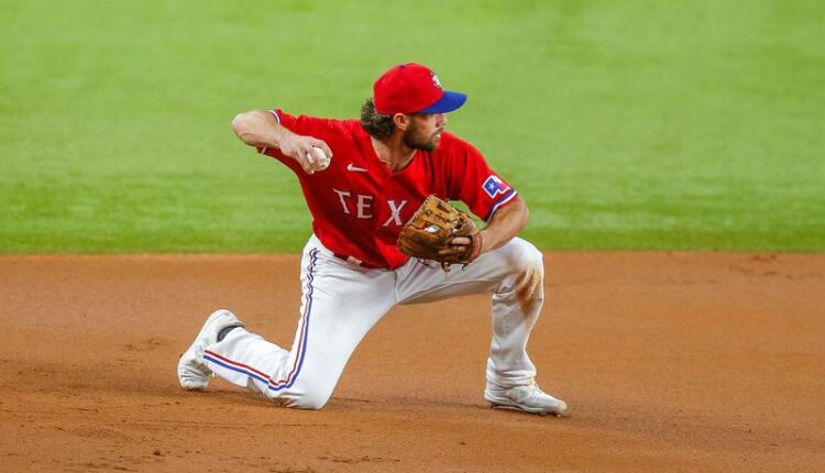 Two big innings propel Rangers past Royals