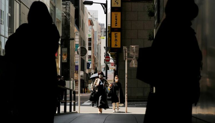 Japan proposes expanding COVID-19 emergency curbs as cases surge, says minister