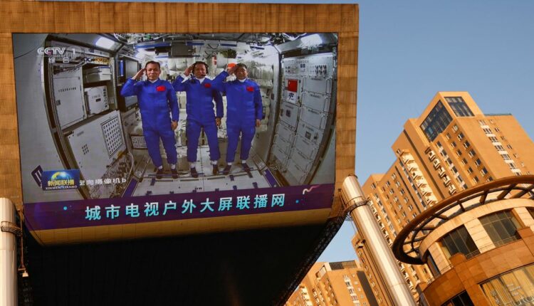 Chinese astronauts return after 90-day mission to space station